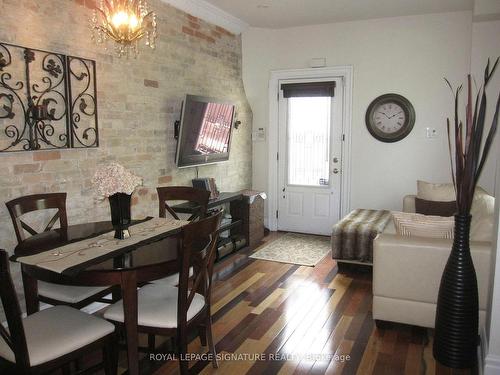 Main-2 A Tiverton Ave, Toronto, ON - Indoor Photo Showing Dining Room With Fireplace