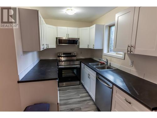 8323 Trans Canada Highway W, Revelstoke, BC - Indoor Photo Showing Kitchen With Double Sink