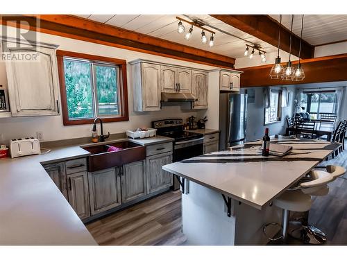 8323 Trans Canada Highway W, Revelstoke, BC - Indoor Photo Showing Kitchen With Double Sink