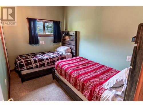 8323 Trans Canada Highway W, Revelstoke, BC - Indoor Photo Showing Bedroom