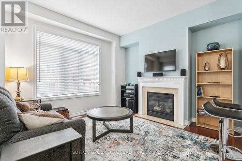 11 Abraham Welsh Road, Toronto, ON - Indoor Photo Showing Living Room With Fireplace