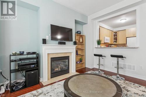 11 Abraham Welsh Road, Toronto, ON - Indoor Photo Showing Living Room With Fireplace