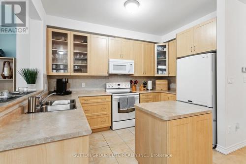 11 Abraham Welsh Road, Toronto, ON - Indoor Photo Showing Kitchen With Double Sink