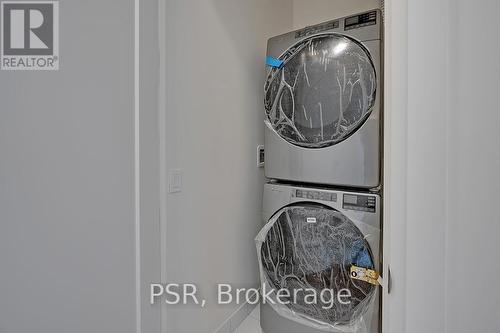 812 - 509 Dundas Street W, Oakville, ON - Indoor Photo Showing Laundry Room