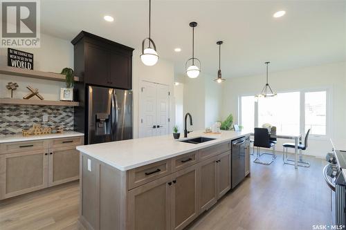 1023 Glacial Shores Common, Saskatoon, SK - Indoor Photo Showing Kitchen With Double Sink With Upgraded Kitchen