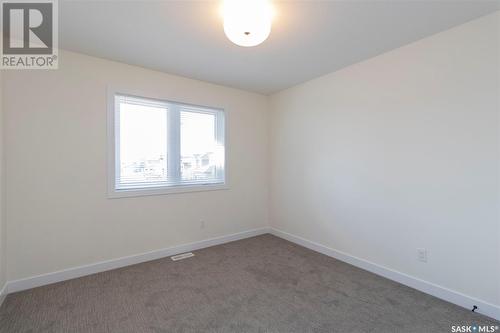 1023 Glacial Shores Common, Saskatoon, SK - Indoor Photo Showing Other Room