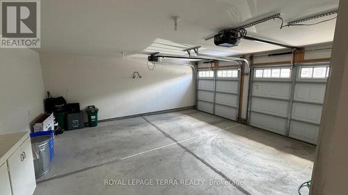 150 - 7607 Green Vista Gate, Niagara Falls, ON - Indoor Photo Showing Garage