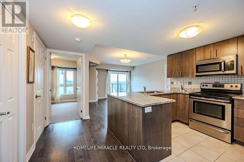 413 - 50 Bryan Court, Kitchener, ON - Indoor Photo Showing Kitchen