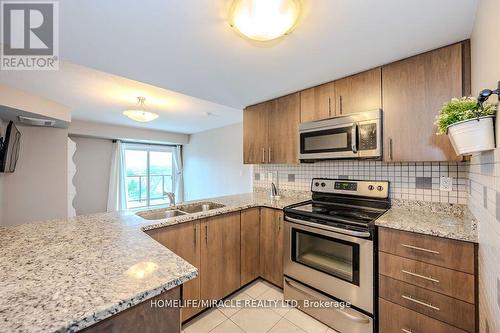 413 - 50 Bryan Court, Kitchener, ON - Indoor Photo Showing Kitchen With Double Sink