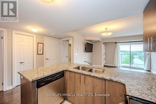 413 - 50 Bryan Court, Kitchener, ON - Indoor Photo Showing Kitchen With Double Sink