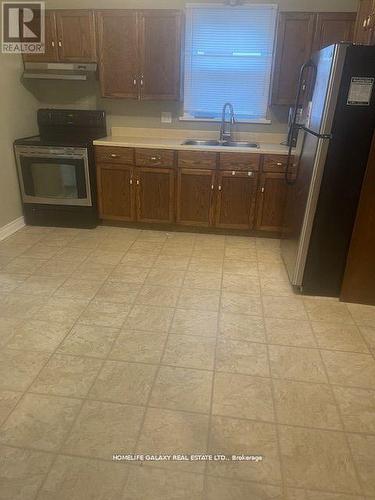 4120 Acheson Avenue, Niagara Falls, ON - Indoor Photo Showing Kitchen With Double Sink