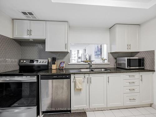 907-5785 Yonge St, Toronto, ON - Indoor Photo Showing Kitchen With Double Sink