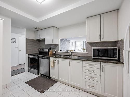 907-5785 Yonge St, Toronto, ON - Indoor Photo Showing Kitchen With Double Sink