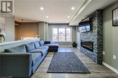 52 Crafter Crescent, Hamilton (Stoney Creek Mountain), ON - Indoor Photo Showing Living Room With Fireplace