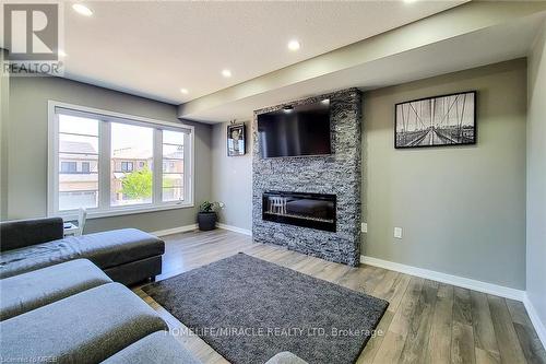 52 Crafter Crescent, Hamilton (Stoney Creek Mountain), ON - Indoor Photo Showing Living Room With Fireplace