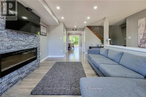 52 Crafter Crescent, Hamilton (Stoney Creek Mountain), ON - Indoor Photo Showing Living Room With Fireplace