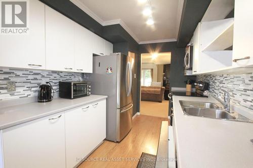 246 - 2075 Walker'S Line, Burlington, ON - Indoor Photo Showing Kitchen With Double Sink