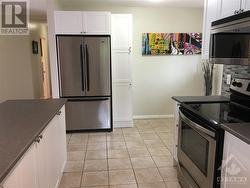 Fridge, pantry and eating area - 