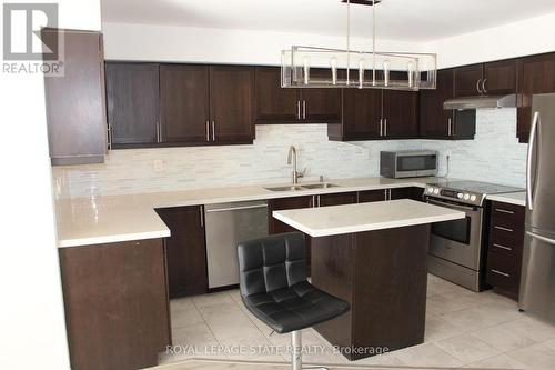 1 - 51 Hays Boulevard, Oakville (Uptown Core), ON - Indoor Photo Showing Kitchen With Double Sink With Upgraded Kitchen