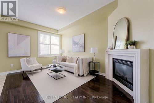 17 Ivy Stone Court, Markham (Cornell), ON - Indoor Photo Showing Living Room With Fireplace