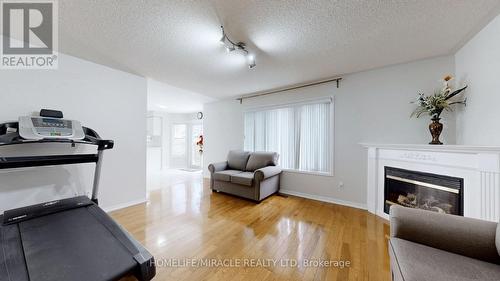 11 Badger Avenue, Brampton (Sandringham-Wellington), ON - Indoor Photo Showing Living Room With Fireplace