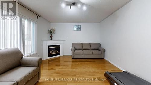 11 Badger Avenue, Brampton (Sandringham-Wellington), ON - Indoor Photo Showing Living Room With Fireplace