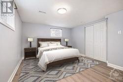 Lower Unit Bedroom Virtually Staged - 