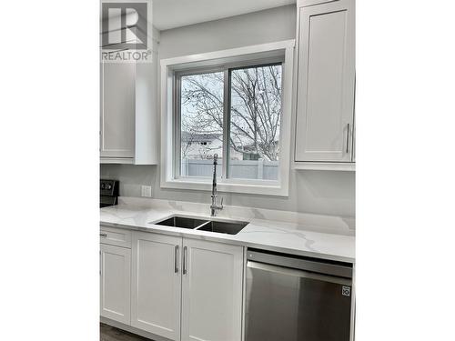 5830 Okanagan Street Unit# 102, Oliver, BC - Indoor Photo Showing Kitchen With Double Sink