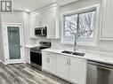 5830 Okanagan Street Unit# 102, Oliver, BC  - Indoor Photo Showing Kitchen With Stainless Steel Kitchen With Double Sink 