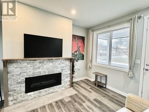 5830 Okanagan Street Unit# 102, Oliver, BC - Indoor Photo Showing Living Room With Fireplace