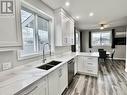 5830 Okanagan Street Unit# 102, Oliver, BC  - Indoor Photo Showing Kitchen With Double Sink With Upgraded Kitchen 