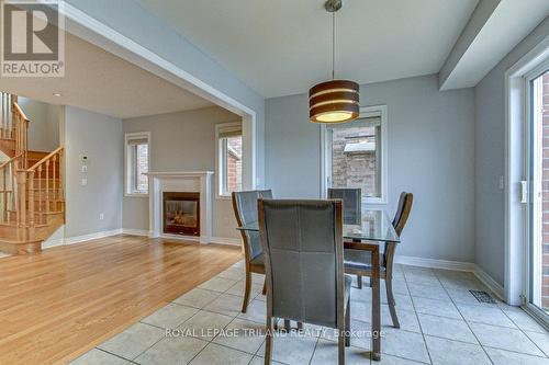 605 Baldwin Crescent S, Woodstock, ON - Indoor Photo Showing Dining Room With Fireplace