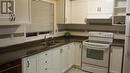 38 - 2 Clay Brick Court, Brampton, ON  - Indoor Photo Showing Kitchen With Double Sink 