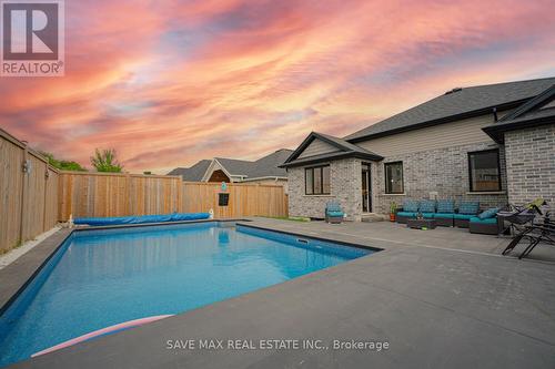 77 Reagan Street, Perth East, ON - Outdoor With In Ground Pool