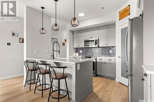 201 4578 Harbour Landing Drive, Regina, SK - Indoor Photo Showing Kitchen With Stainless Steel Kitchen With Upgraded Kitchen