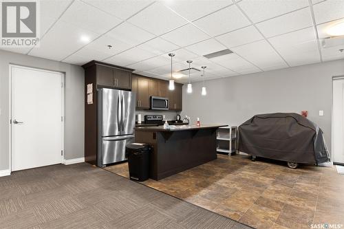 201 4578 Harbour Landing Drive, Regina, SK - Indoor Photo Showing Kitchen With Stainless Steel Kitchen