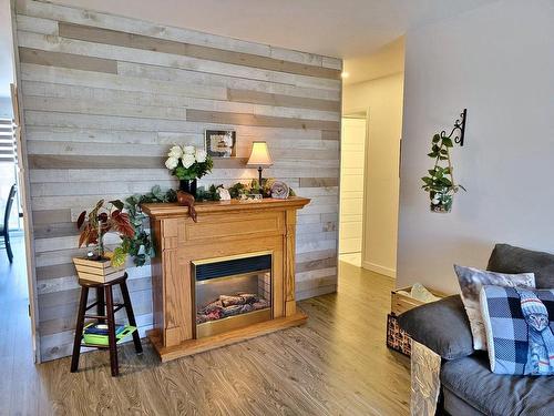 Dwelling - 313 Mtée Sanche, Boisbriand, QC - Indoor Photo Showing Living Room With Fireplace