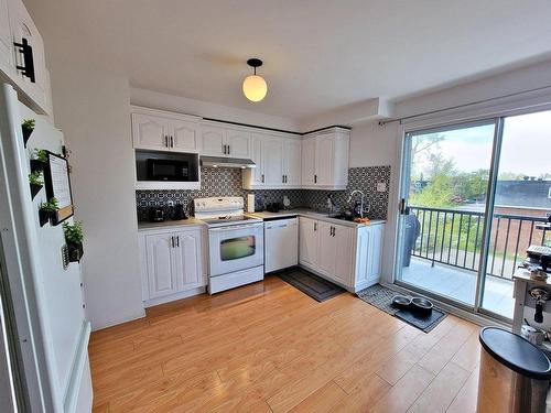 Logement - 313 Mtée Sanche, Boisbriand, QC - Indoor Photo Showing Kitchen