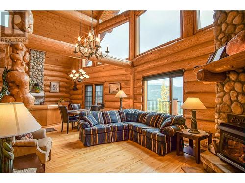 20 Valeview Road, Lumby, BC - Indoor Photo Showing Living Room With Fireplace