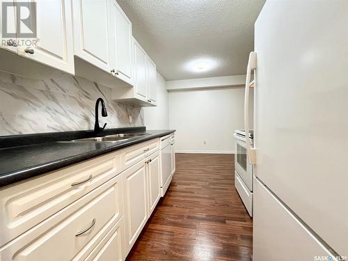 507 1580 Olive Diefenbaker Drive, Prince Albert, SK - Indoor Photo Showing Kitchen With Double Sink