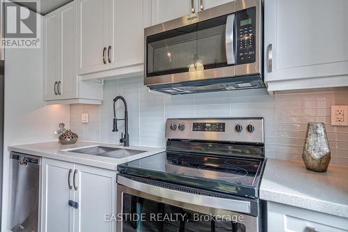 23 - 85 Eastwood Park Gardens, Toronto (Long Branch), ON - Indoor Photo Showing Kitchen With Double Sink With Upgraded Kitchen