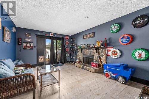 1430 Hochelaga Street W, Moose Jaw, SK - Indoor Photo Showing Other Room With Fireplace