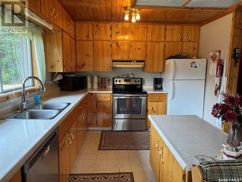 1402 Nikik Avenue, Missinipe, SK - Indoor Photo Showing Kitchen With Double Sink