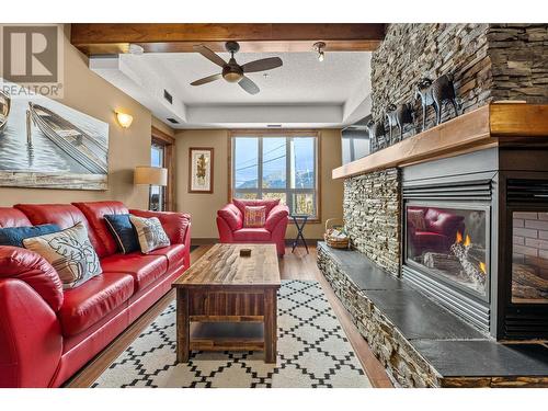 7495 Columbia  Avenue Unit# 1204, Radium Hot Springs, BC - Indoor Photo Showing Living Room With Fireplace