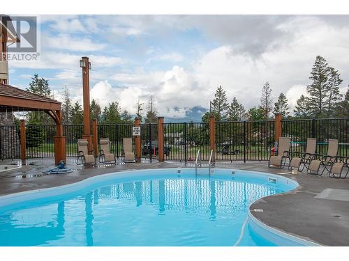 7495 Columbia  Avenue Unit# 1204, Radium Hot Springs, BC - Outdoor With In Ground Pool With Backyard