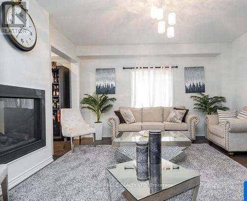 279 Northglen Boulevard, Clarington (Bowmanville), ON - Indoor Photo Showing Living Room With Fireplace