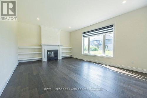 53 Hazelwood Pass, Thames Centre (Dorchester), ON - Indoor Photo Showing Other Room With Fireplace