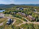 Photo aÃ©rienne - 10-1520 Ch. Du Versant-Soleil, Mont-Tremblant, QC  - Outdoor With Body Of Water With View 