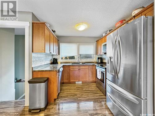 2051 97Th Street, North Battleford, SK - Indoor Photo Showing Kitchen With Stainless Steel Kitchen With Double Sink