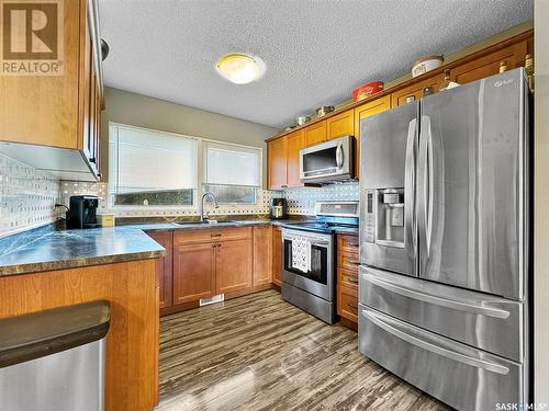 2051 97Th Street, North Battleford, SK - Indoor Photo Showing Kitchen With Stainless Steel Kitchen With Double Sink